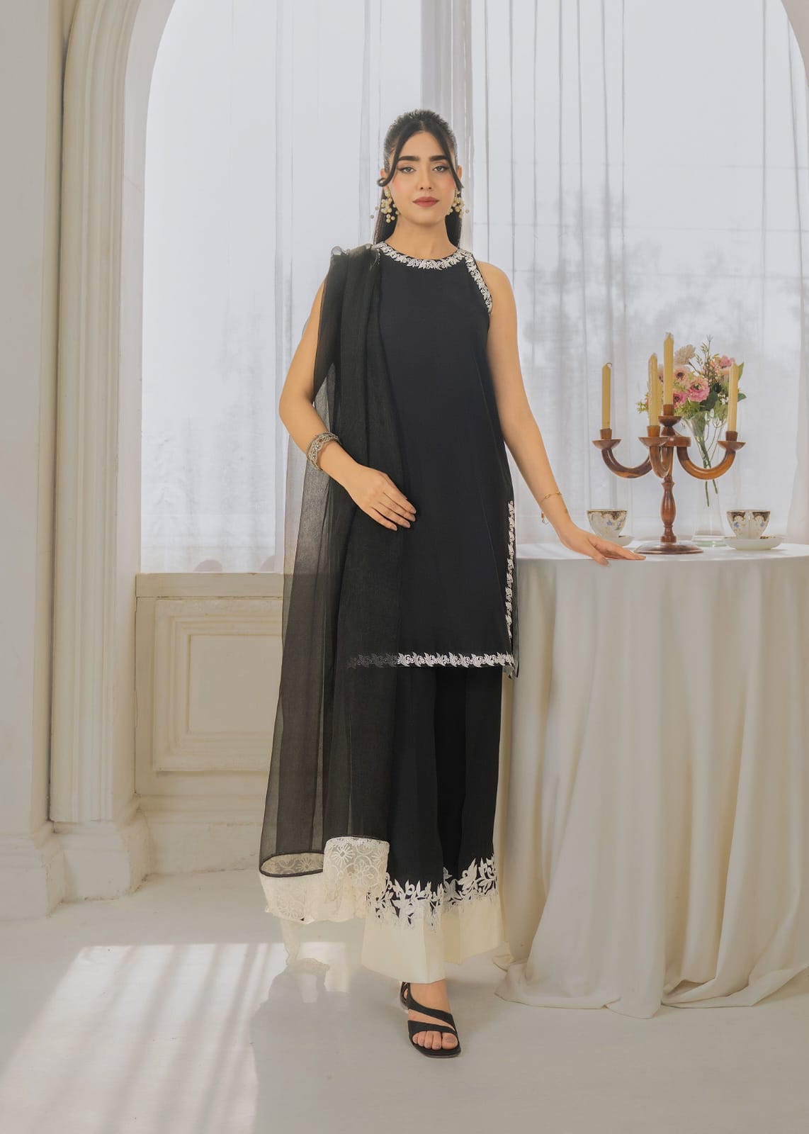 Black Royal silk embroidered short shirt with culottes and organza dupatta by Ezno