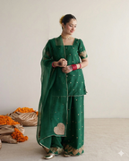 Sheer organza dupatta with bottle green raw silk outfit Mehmal Ezno