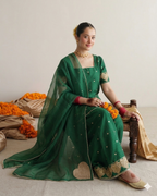 Bottle green short embroidered raw silk kurta Mehmal Ezno